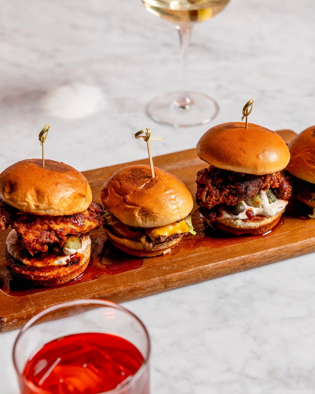 Slider flight — hot chicken, cheeseburger, more